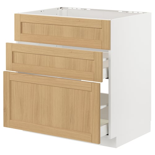 Ikea METOD kitchen cabinet with forsbacka oak drawers. White and light brown, rectangular, minimalist.