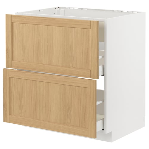 Modern kitchen cabinet with oak drawers and white frame.
