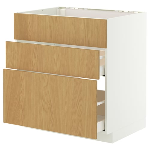 White kitchen cabinet with oak drawers.