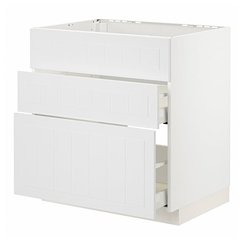 White METOD kitchen cabinet with multiple drawers, smooth panels.