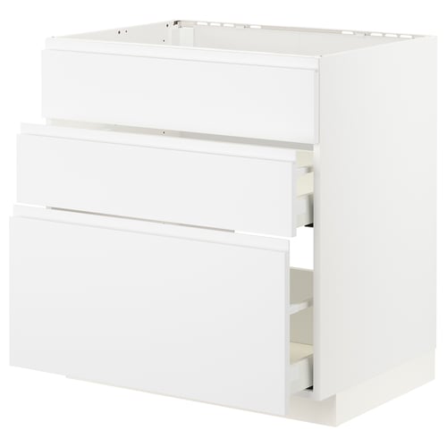 White modern kitchen cabinet with integrated handles and smooth-running drawers.
