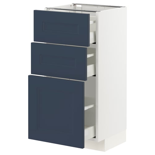 Modern METOD kitchen cabinet with blue axstad drawers and white base.