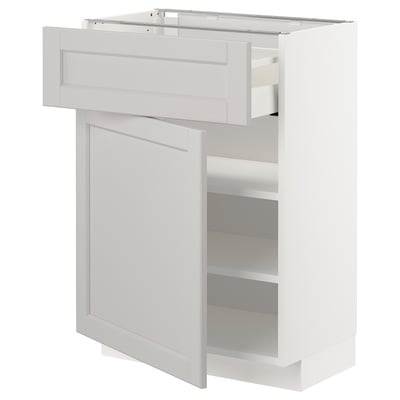 White METOD kitchen cabinet with drawer and shelves, sleek design, smooth finish.