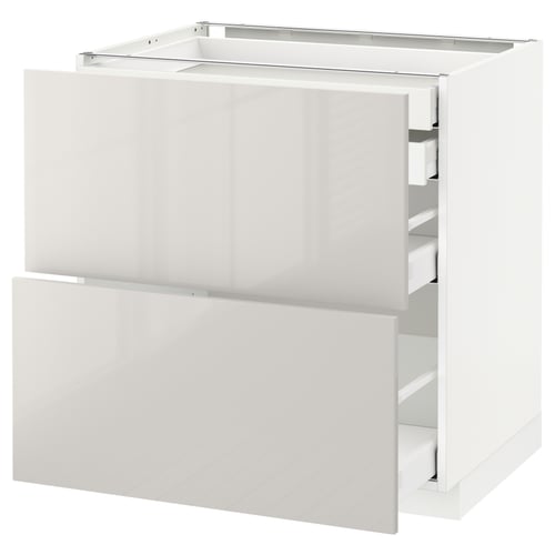 White METOD kitchen unit with glossy drawer, modern design.