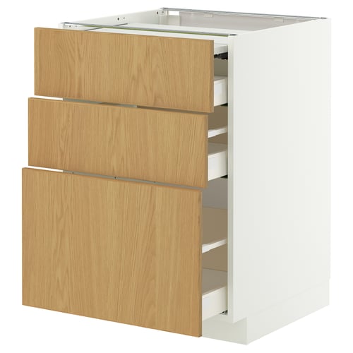 An off-white METOD kitchen cabinet with three light oak drawers. The drawers are partially open, revealing storage space inside.