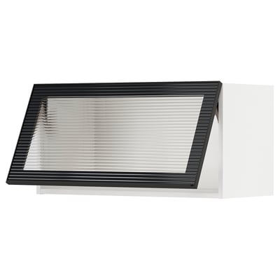Black modern kitchen cabinet with bevelled glass door. Sleek and minimal.