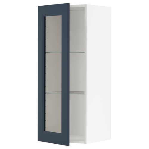 Ikea METOD cabinet with blue glass door and white interior.