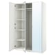 An open white ikea PAX wardrobe with mirrored doors, showcasing its internal storage compartments.