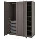 An open grey PAX wardrobe with mesh baskets and shelves for storage.