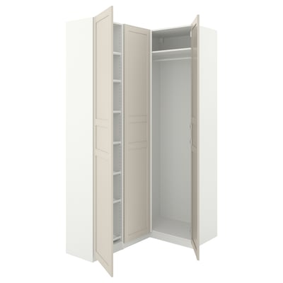 An off-white IKEA PAX wardrobe with open doors revealing shelves and a clothes rod.