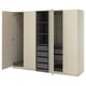 An open beige ikea PAX wardrobe with shelves and drawers.