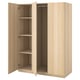 Light wood PAX wardrobe, open doors revealing empty shelves.