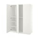 This image a white ikea PAX wardrobe with open doors revealing adjustable shelves. The modern, minimalist design offers ample storage space.