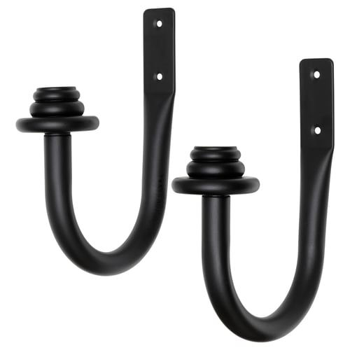 Image shows black PILÖRTSFLY curtain tie-backs, modern design with wooden finials.