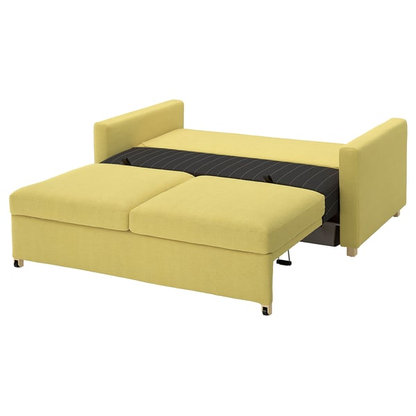 Yellow convertible sofa-bed with black seat cushions, modern minimalist design and wooden legs.