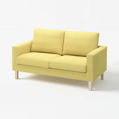 Bright yellow modern sofa with square cushions and wooden legs.