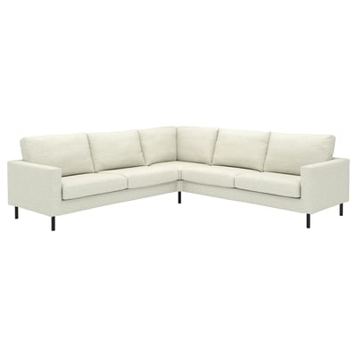 SALTSJÖBADEN l-shaped sofa, cream-colored, upholstered with light fabric and dark wooden legs.