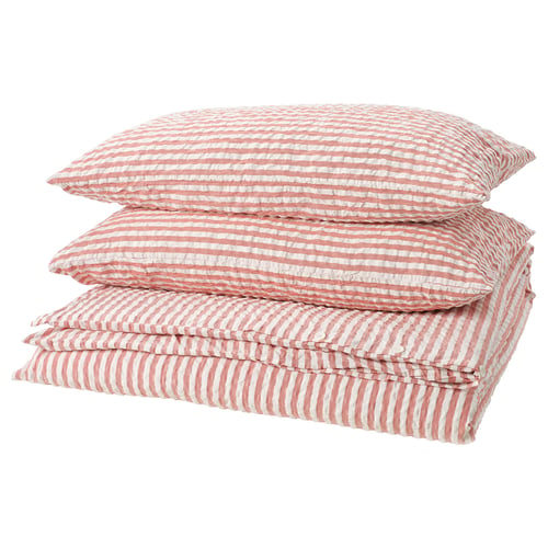 Stacked red-white striped pillows, rectangular, with wavy seersucker pattern.
