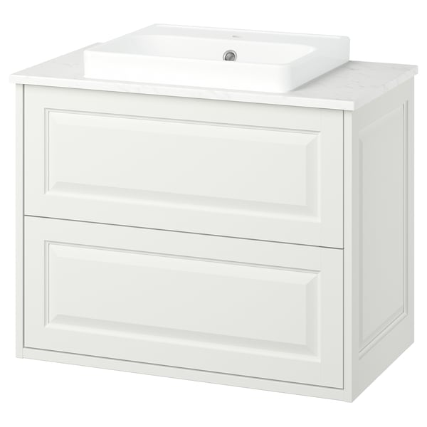 White TÄNNFORSEN bathroom vanity with marble top and sink.