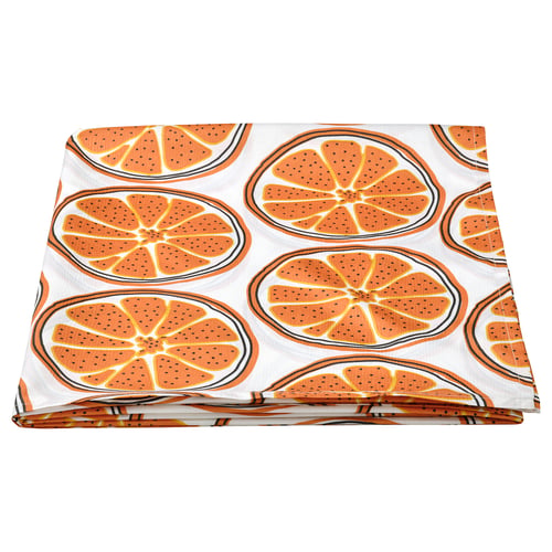 Folded orange slice pattern tablecloth, vibrant on white, recycled polyester material.
