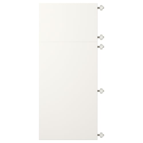 White VEDDINGE cabinet door with nickel-plated hinges.