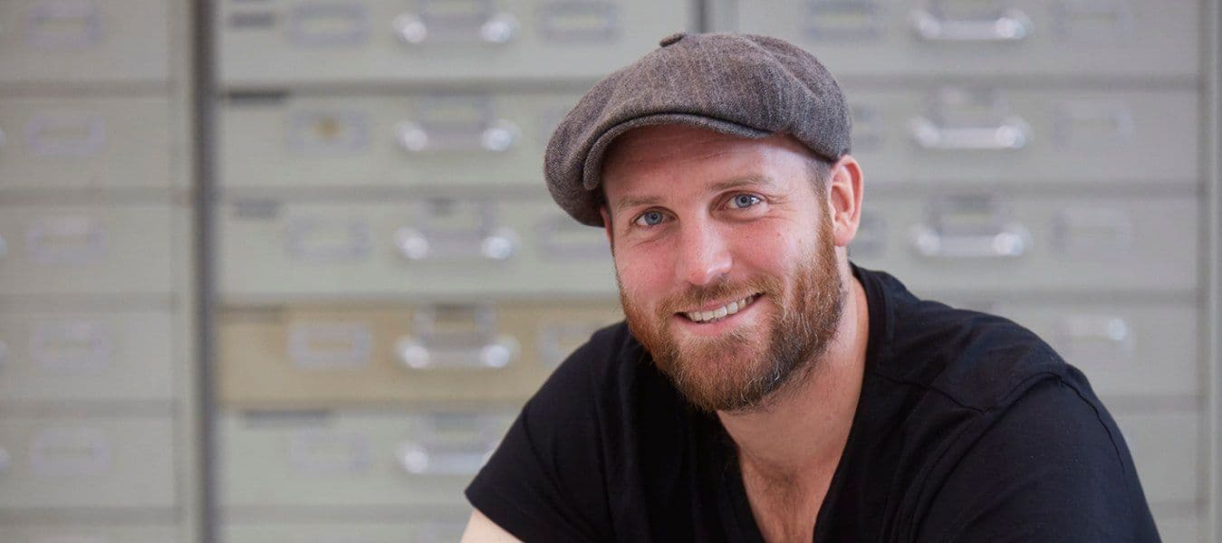 Portrait of a man in a cap.