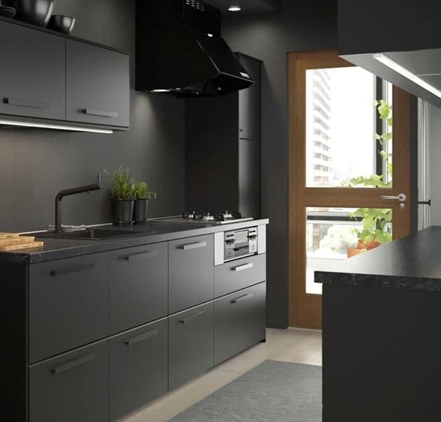 A black kitchen featuring KUNGSBACKA kitchen fronts.