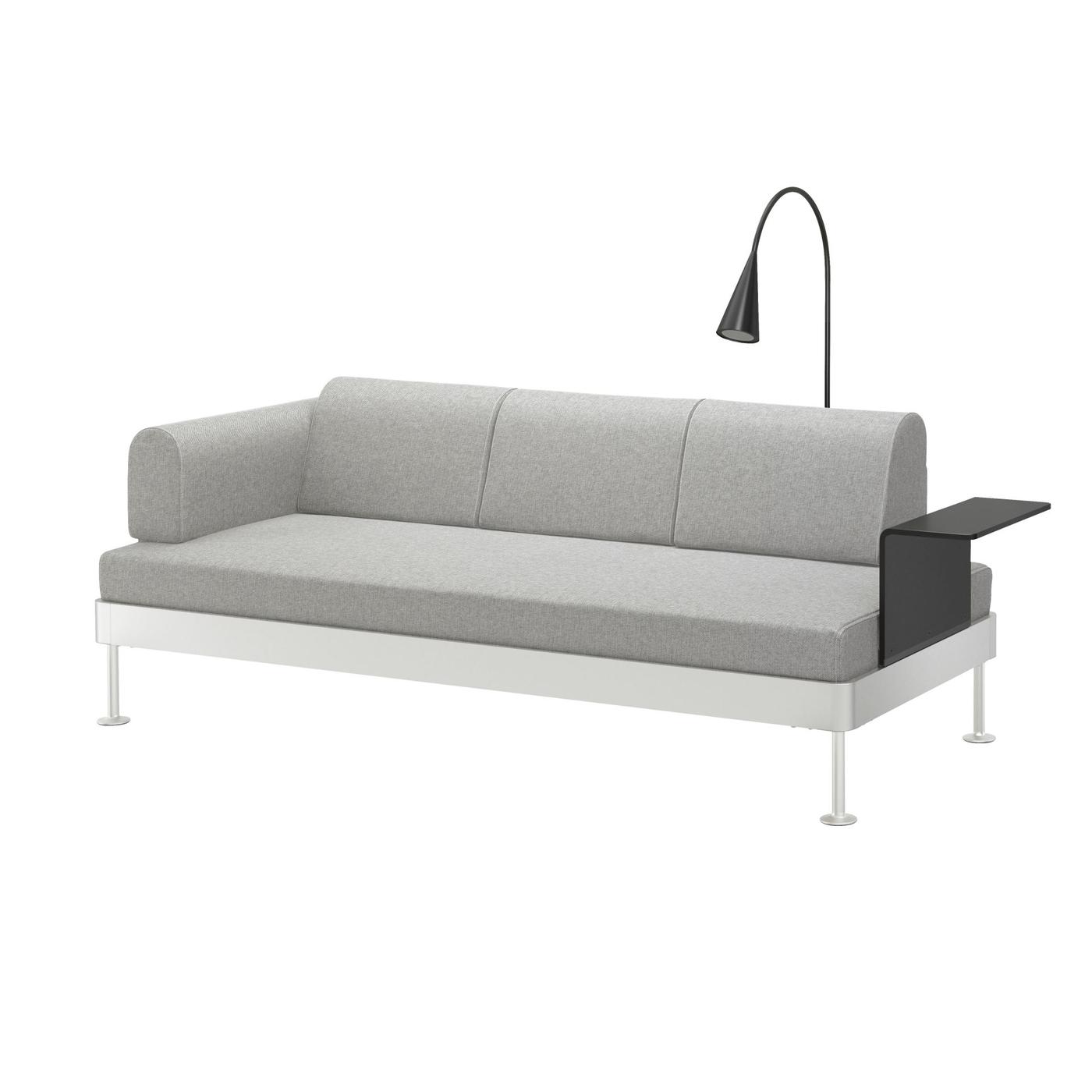 Modern, light grey sofa on a white background.