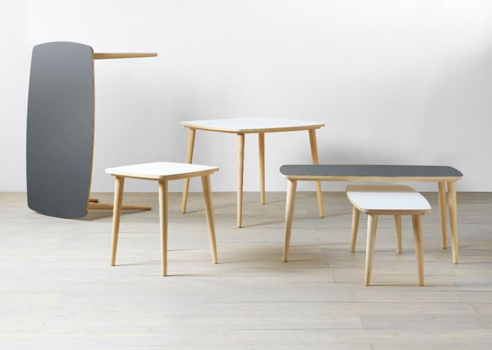 Display of tables from the OMTÄNKSAM series in different colours and sizes.