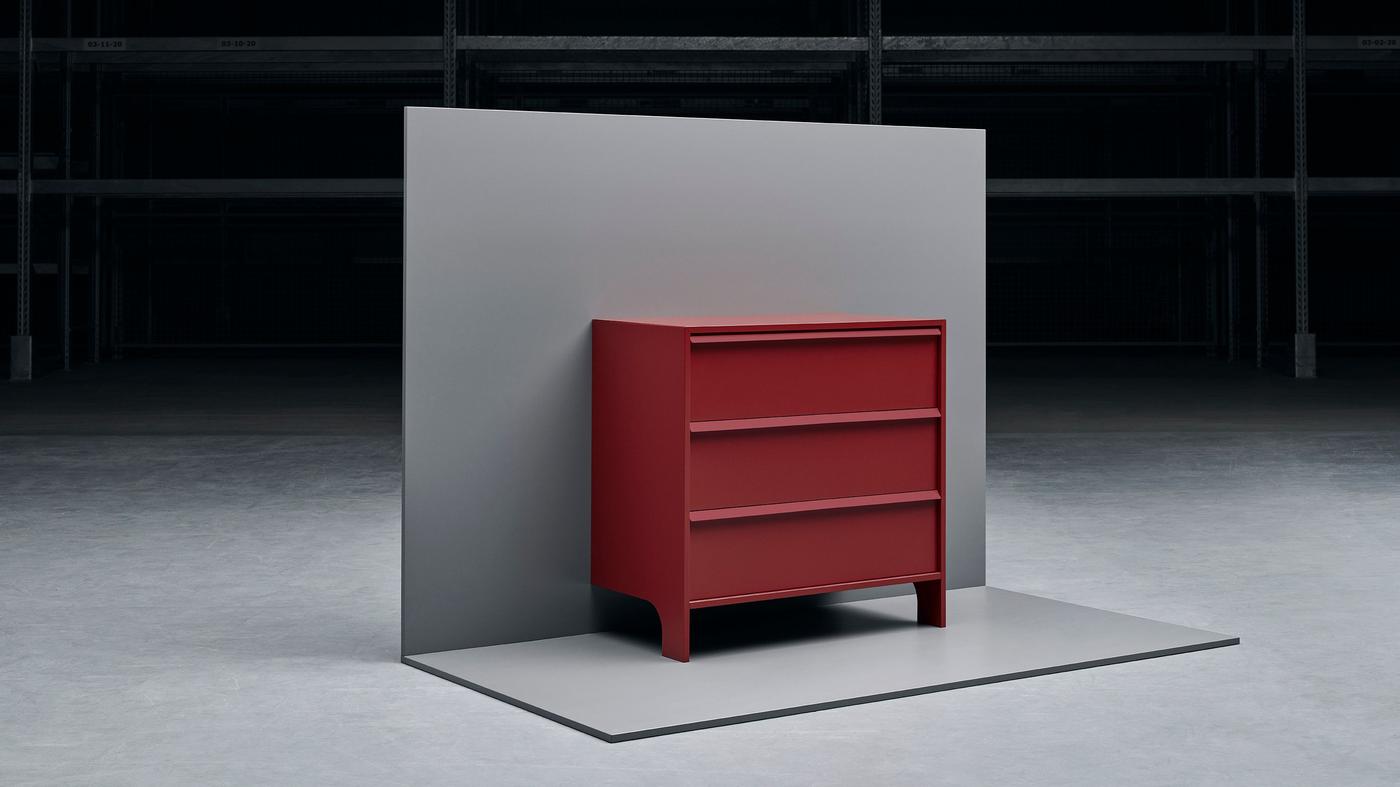 GLESVÄR chest of drawers in red against a grey studio background.