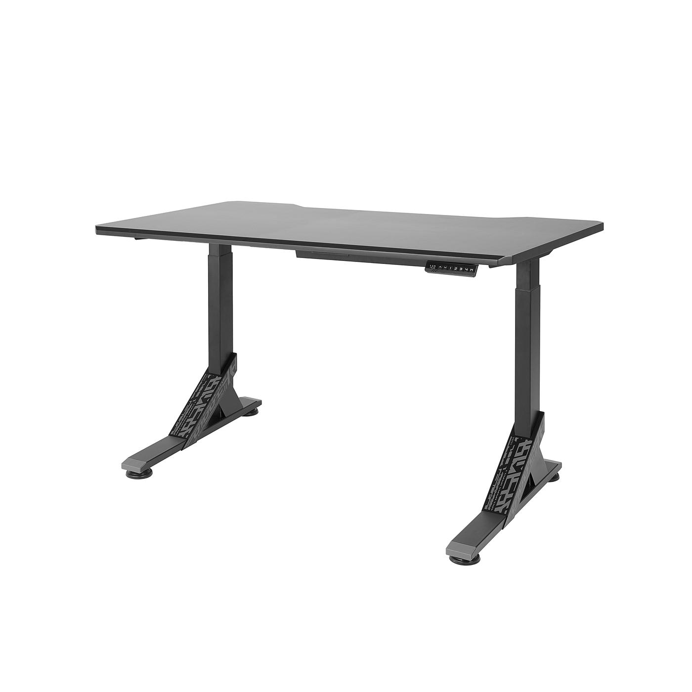 A black height adjustable gaming desk against a white background.