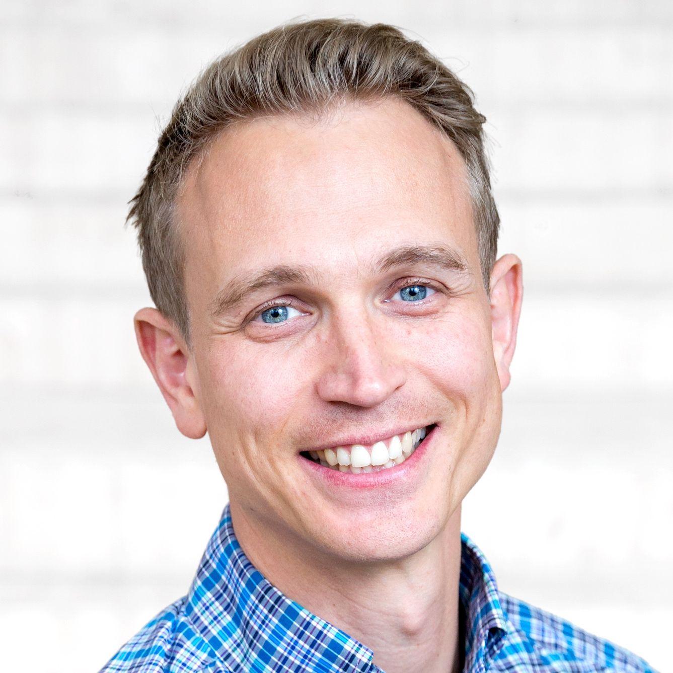 A portrait of Engineering Manager, Gustav Kamf.
