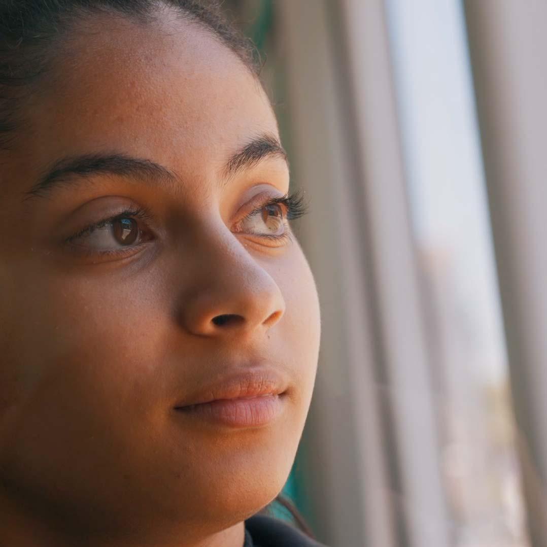 Nyhed looks out of the window.