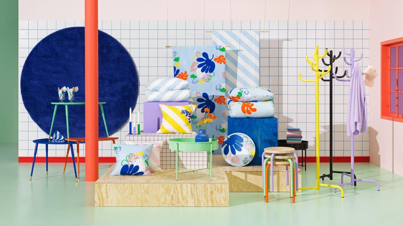 A collection of colourful IKEA vintage products standing in a room.