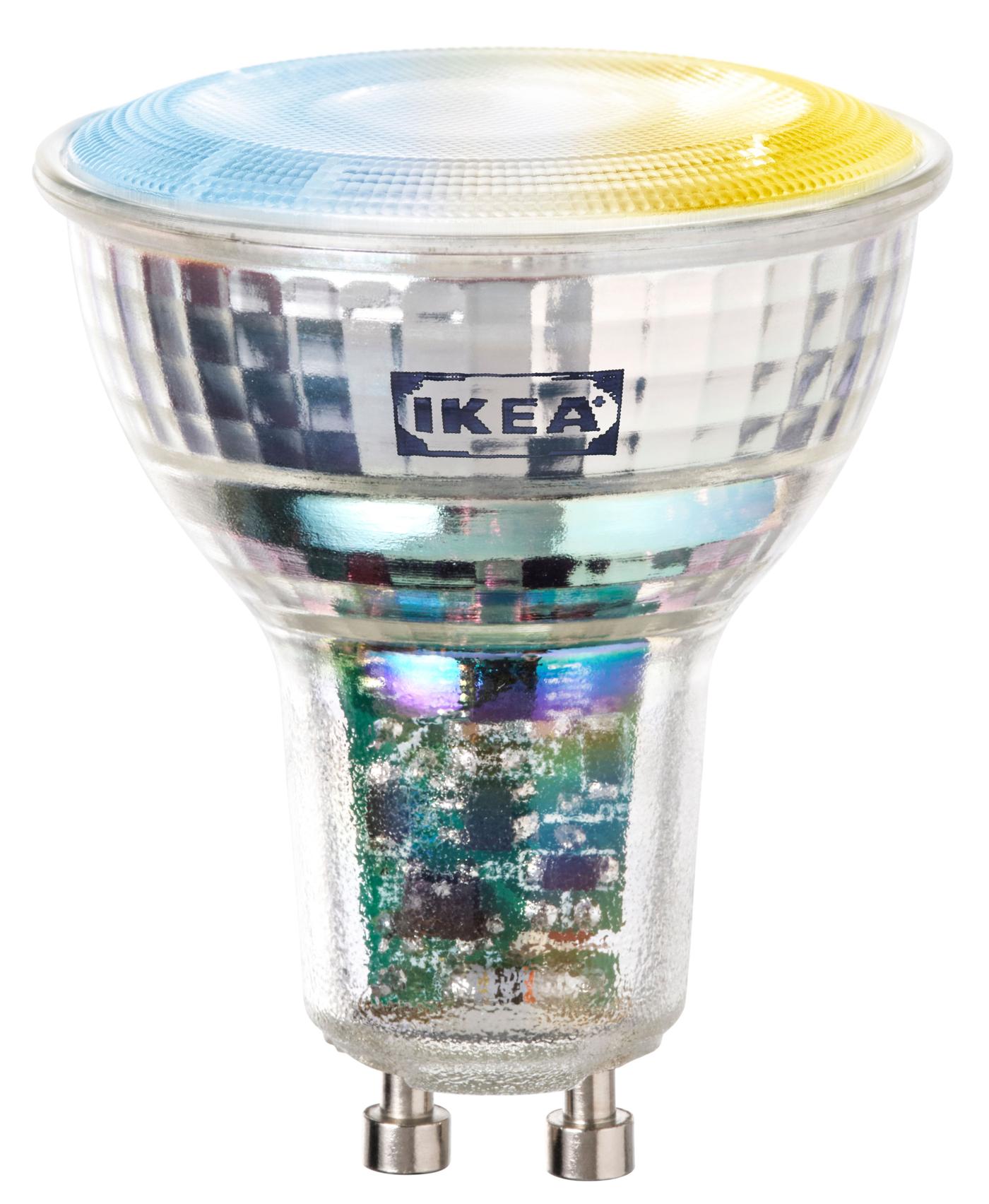 Silver directional spotlight bulb with flat surface, featuring blue and yellow colouring, shown against a transparent background.