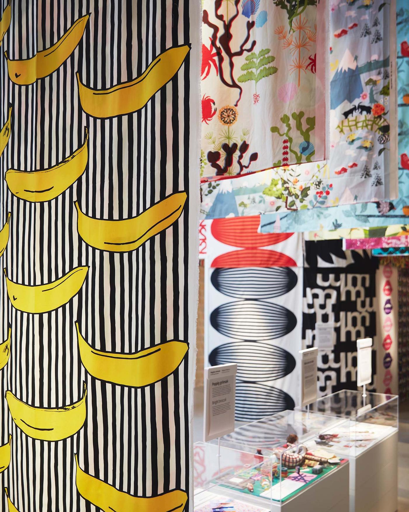 An assortment of patterned textiles on display at the IKEA Museum.