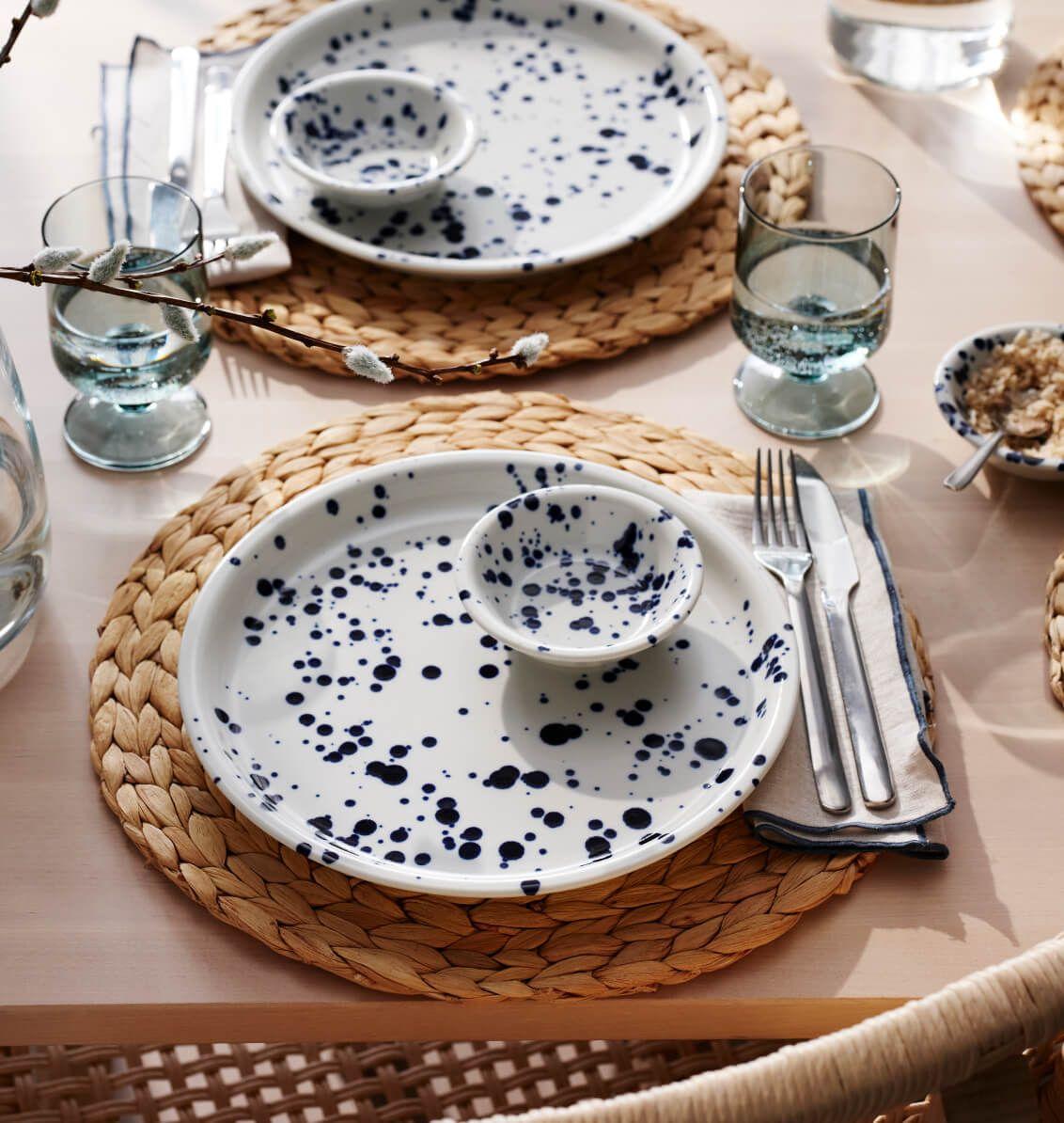 A table set with SILVERSIDA plates and bowls.