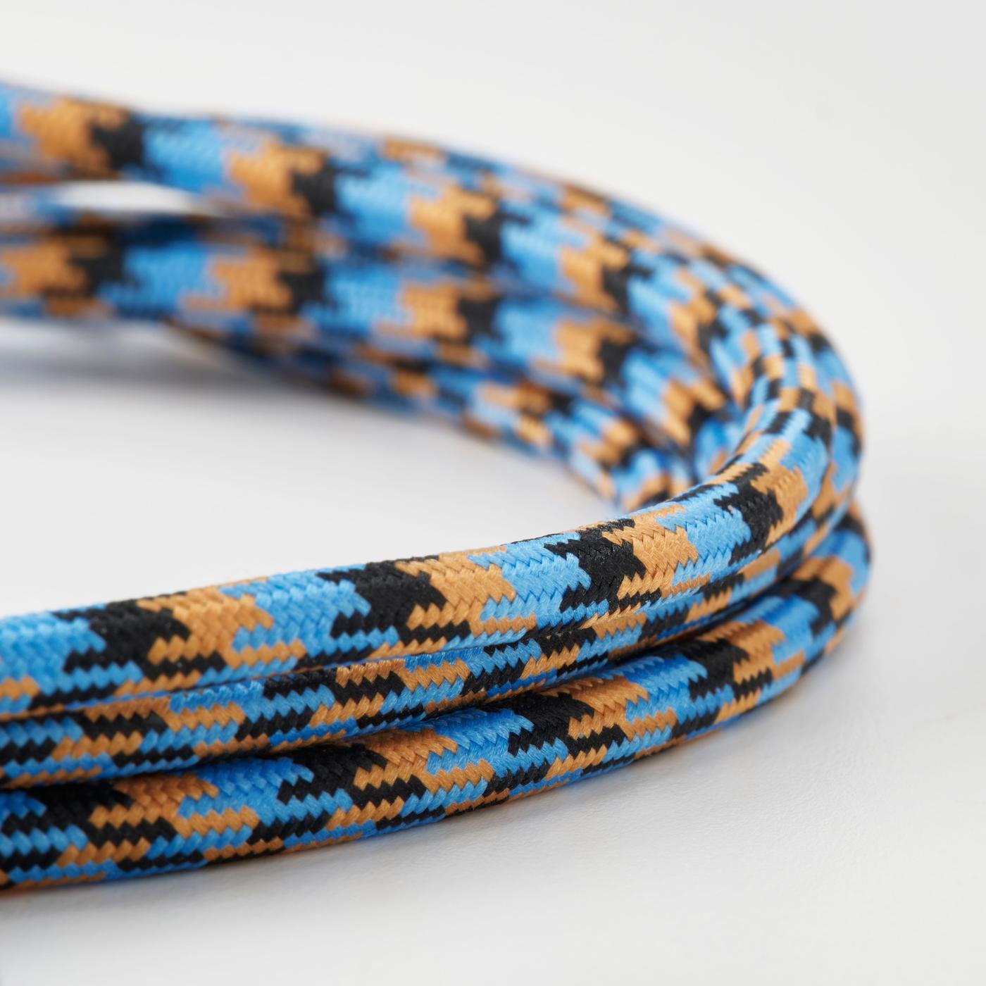 Close-up of a blue charging cable with yellow-orange and black patterned details.