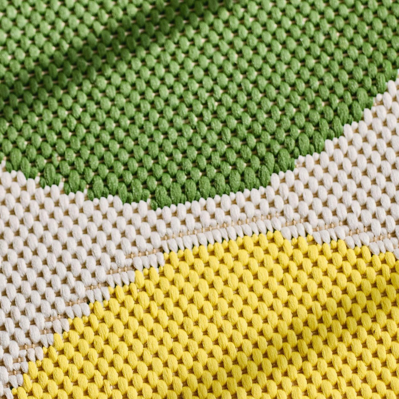 A close-up of a BRÖGGAN rug flatwoven.