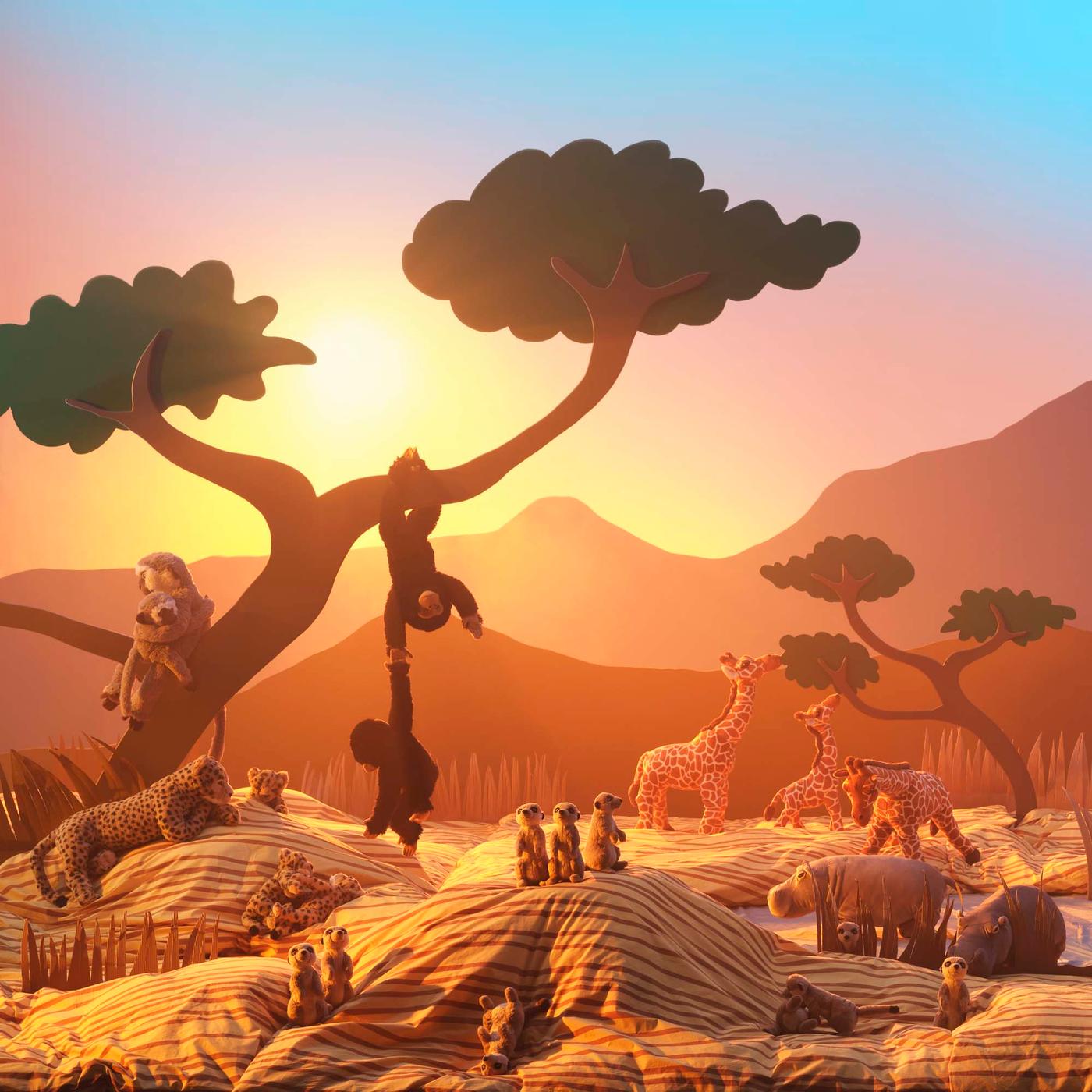 A scene showing soft toy wild animals in an imaginary African savannah setting.