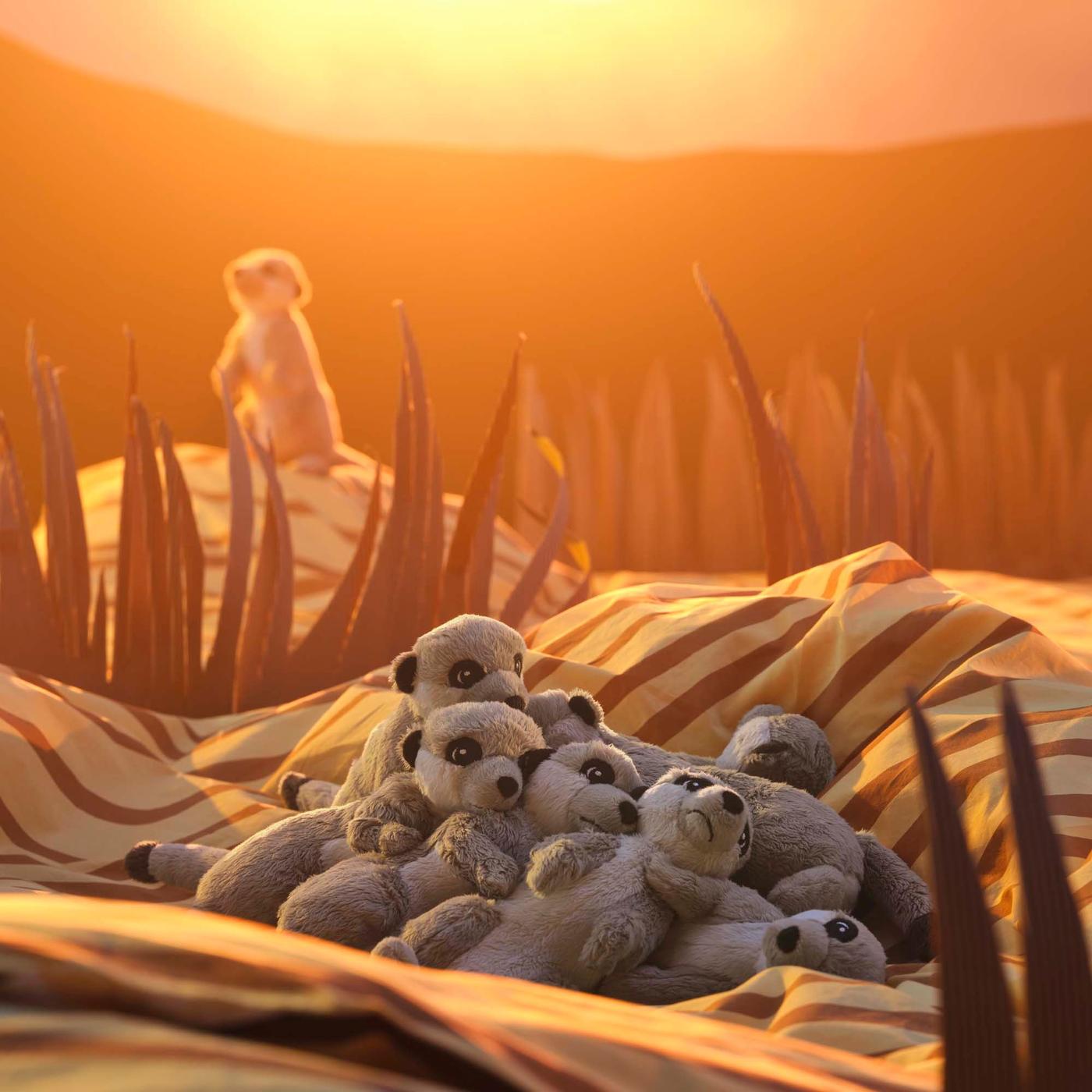 A pile of soft toy meerkats in the imaginary setting of the African savannah.