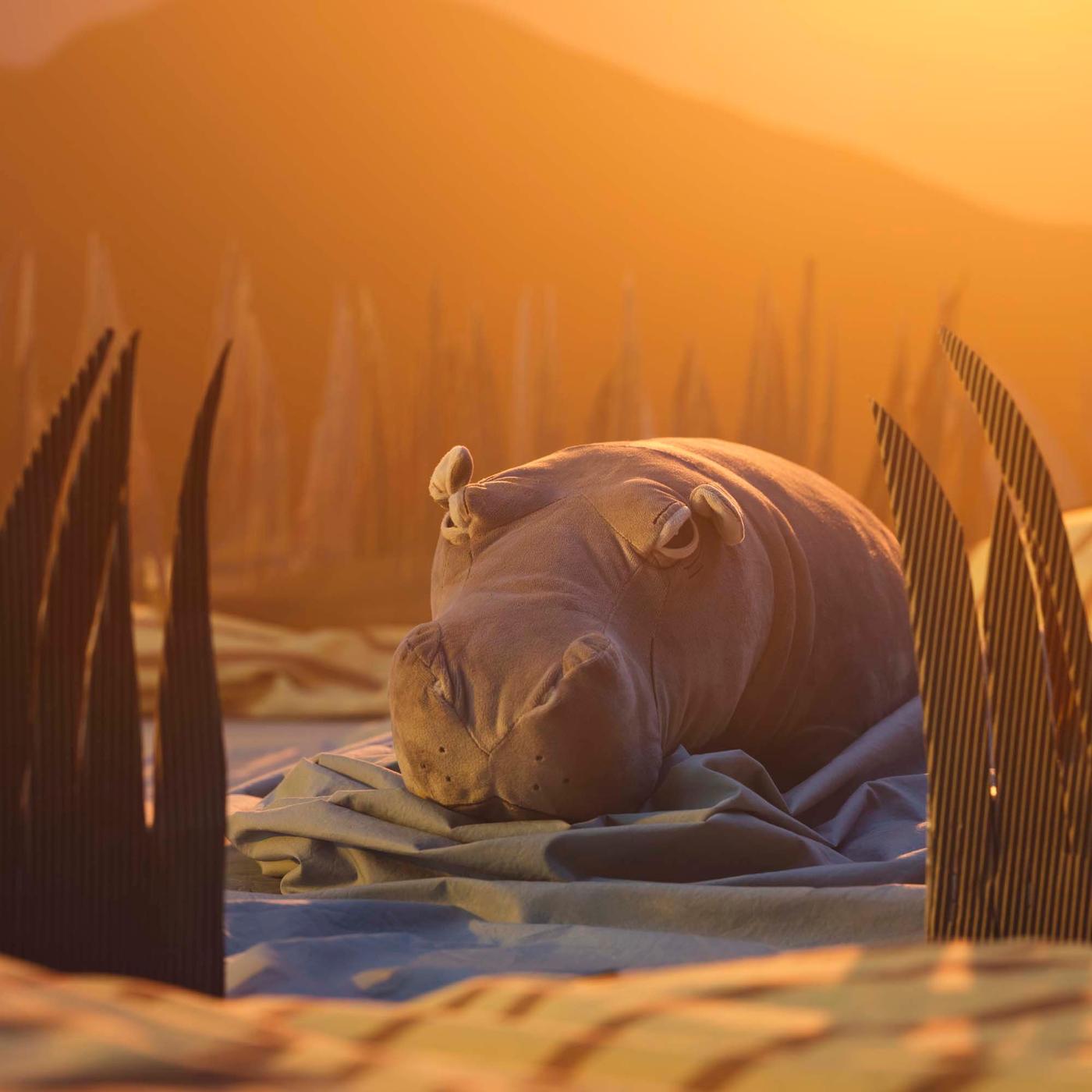 A soft toy hippo wallows in the water in an imaginary African savannah setting.
