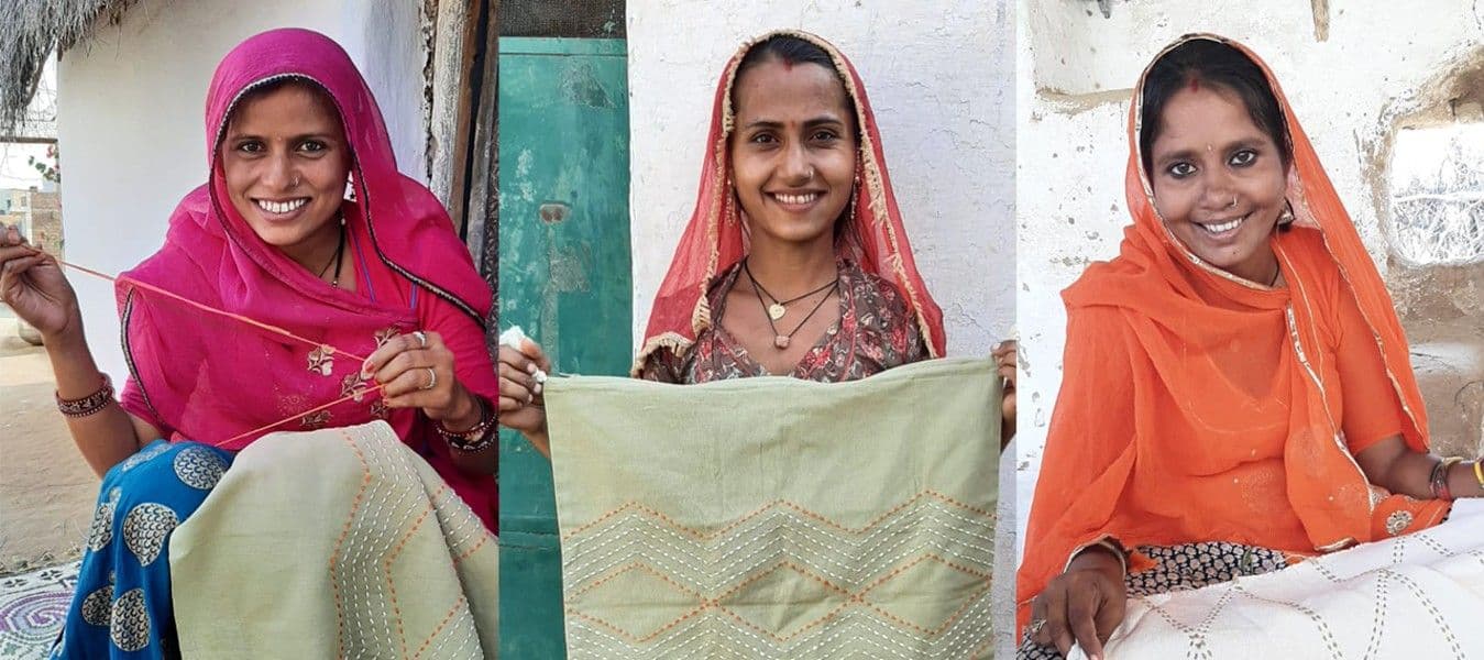 Three artisans and their embroideries.