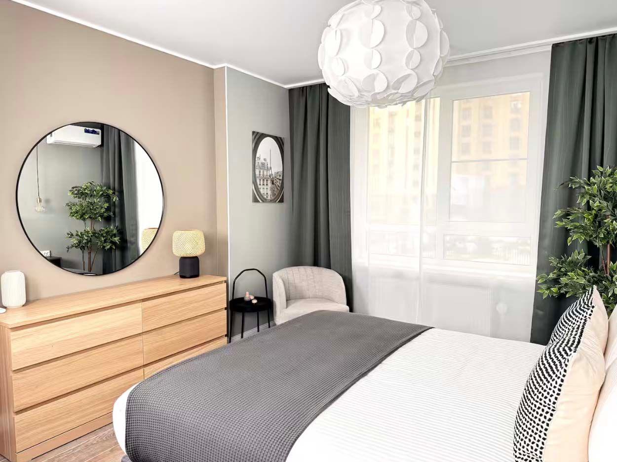 The bedroom of the Stylish Design Apartments Airbnb in Almaty, Kazakhstan.