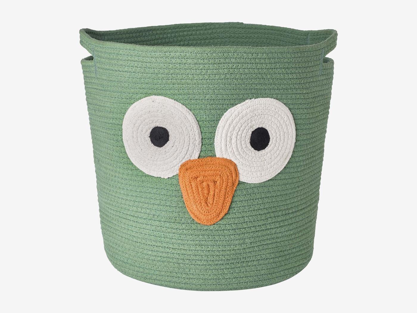 A green UPPSTÅ storage basket with two eyes and a beak.