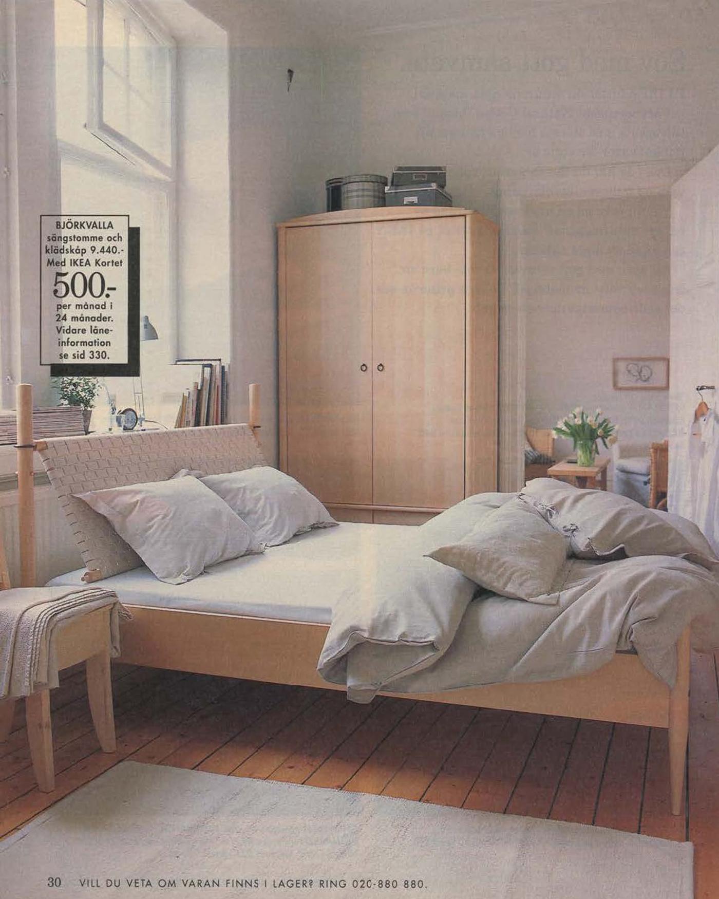 A page from the 1996 IKEA Catalogue featuring a light wood bed with pale coloured bedlinen that feature tie closures.