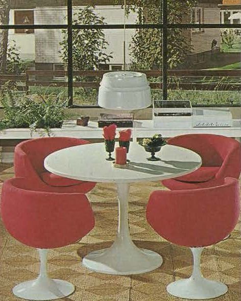 A dining room set in white plastic and red upholstery from the 1973 IKEA catalogue