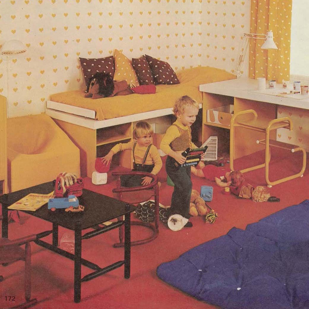 The 1974 IKEA catalogue showing two children playing in a children's bedroom  with toys on the floor.