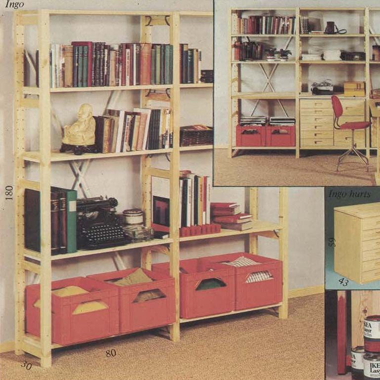 Wooden shelves filled with books, folders and boxes.