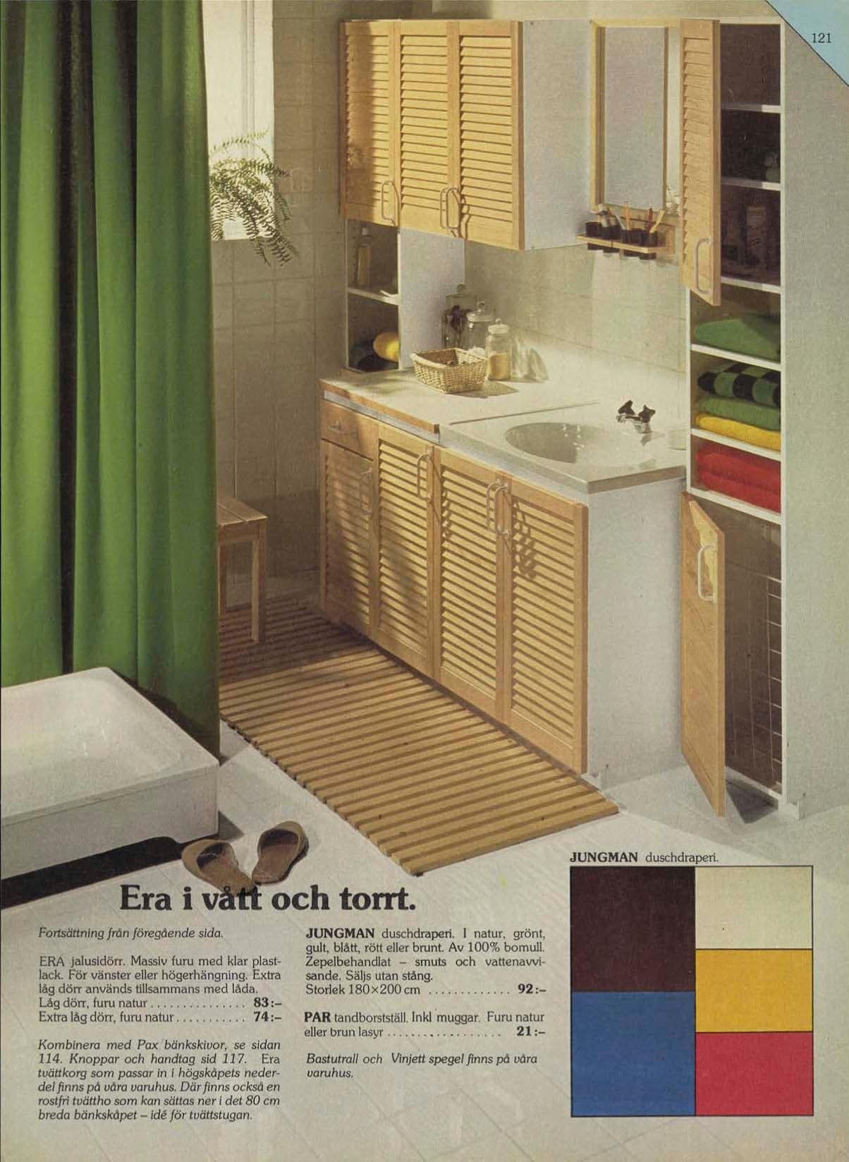 Pine bathroom cabinet doors in a small white bathroom.